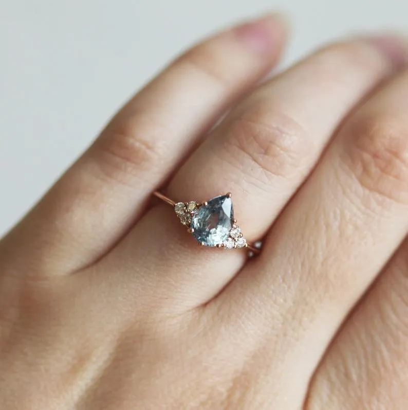 Jeanie Silvery Blue-Green Sapphire Ring W/ Diamond Clusters